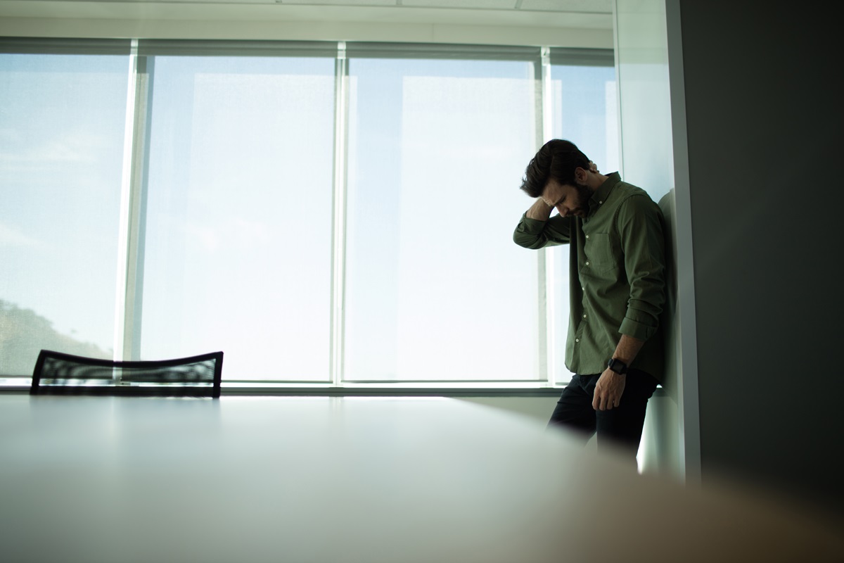 Depressed Businessman Standing By Window 2025 04 03 01 33 41 Utc